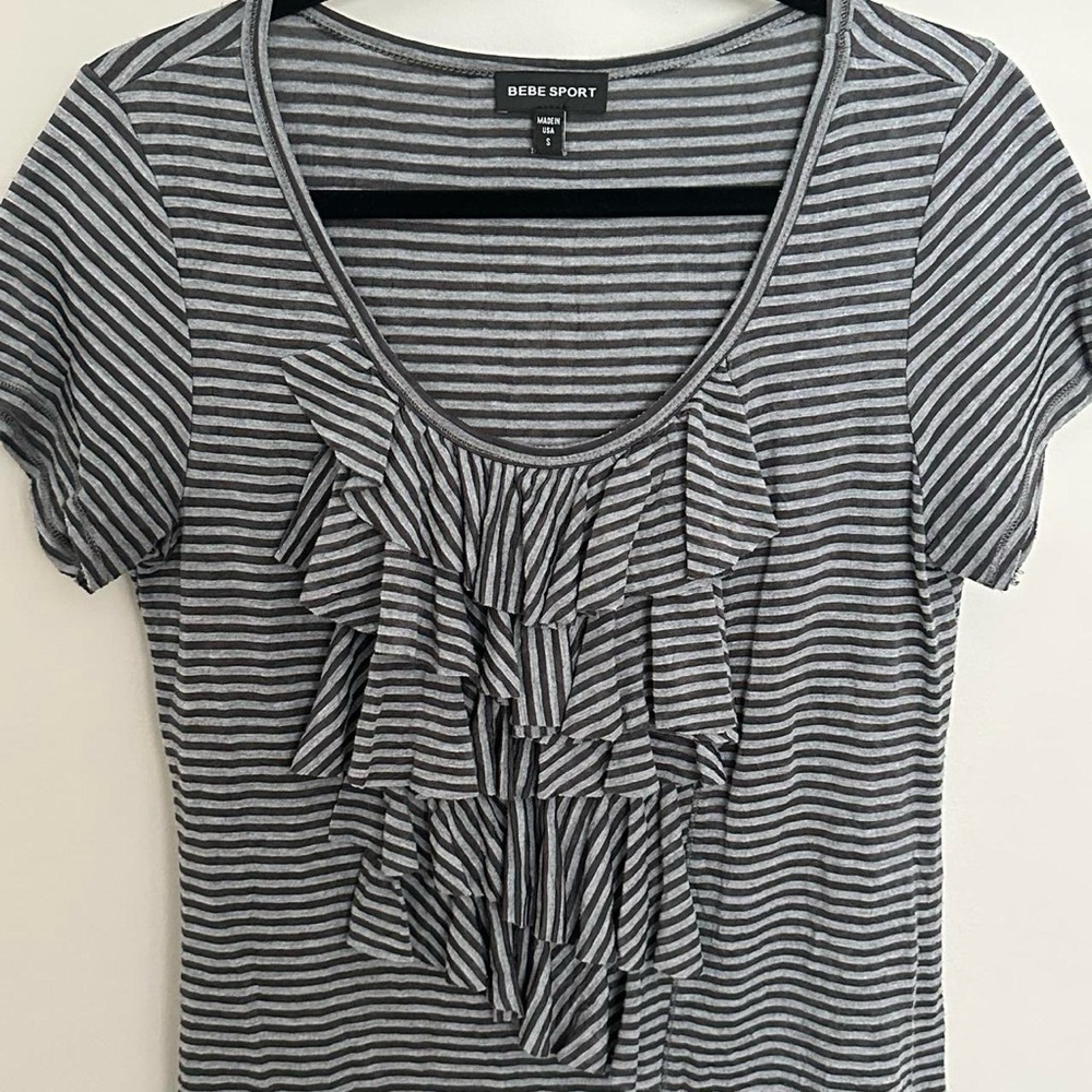 Bebe sport Grey and black striped ruffle top
Size small
